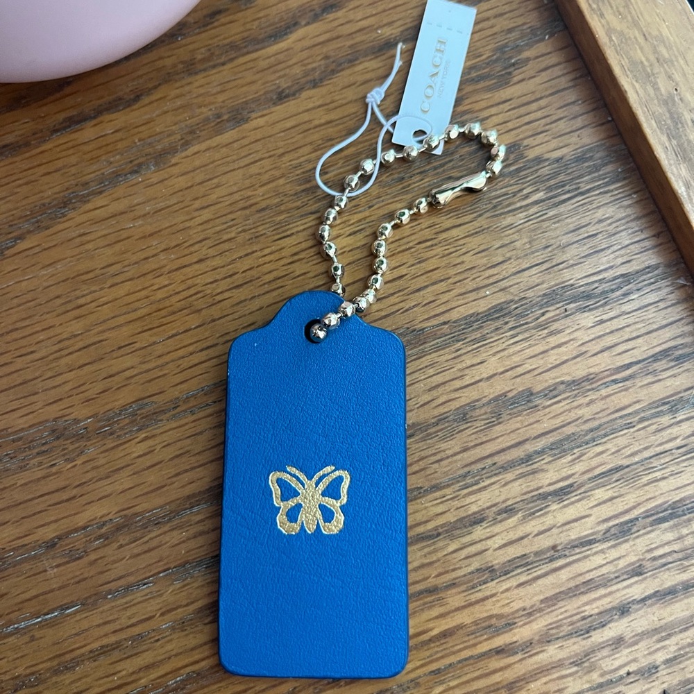 Coach Royal Blue Tag. Butterfly with Gold Chain